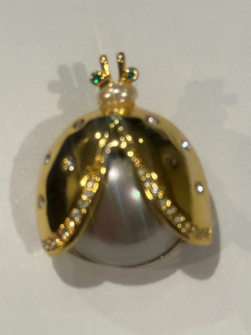 Vintage Gold Tone Faux Pearl Rhinestone Beetle Bug Green Eyes Scarab Brooch Pin